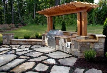 Outdoor Kitchen with Cedar Arbor and Stone Patio in Lawrenceville, GA