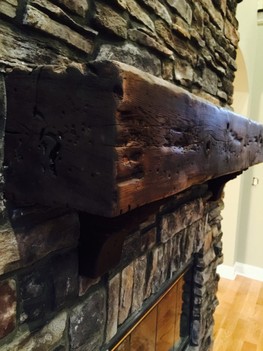 Wolf Creek Southern Ledge stone fireplace with distressed corbels and mantle Roswell, GA