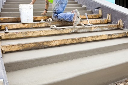 Allgood Construction Services, Inc. mason building cement steps in Woodstock, GA.